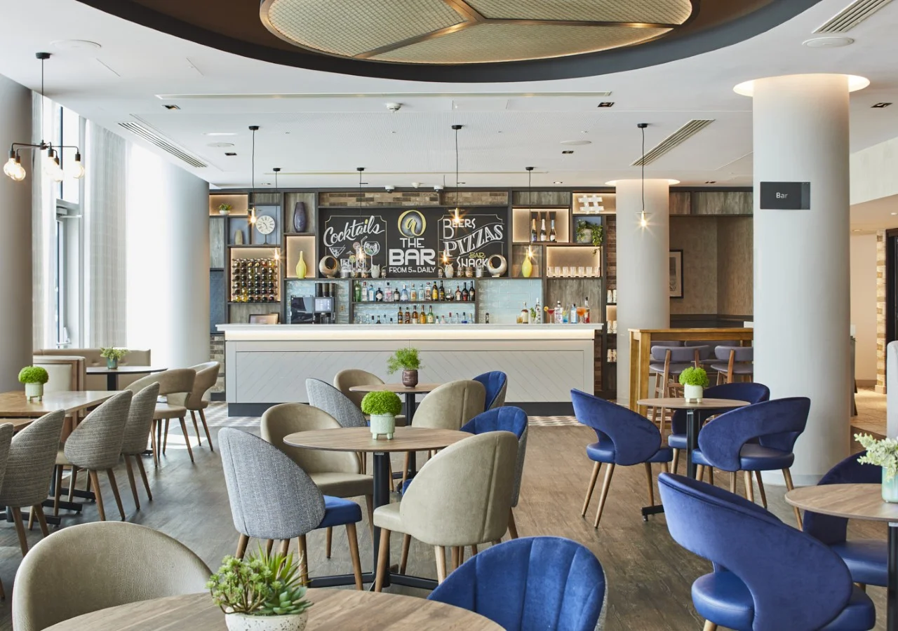 Modern bar interior with stylish seating.