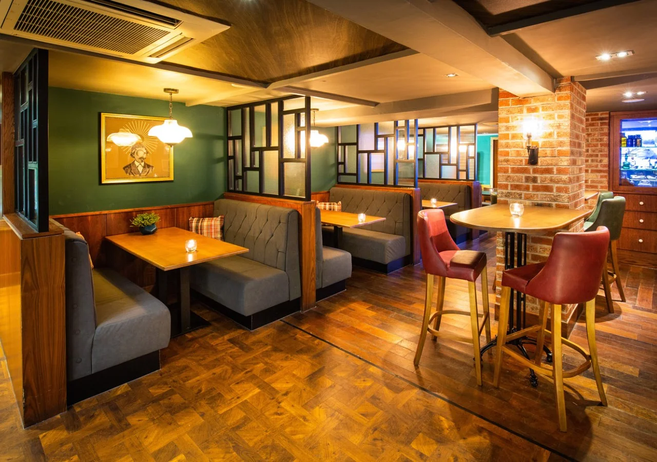 Cozy restaurant interior with wooden decor.