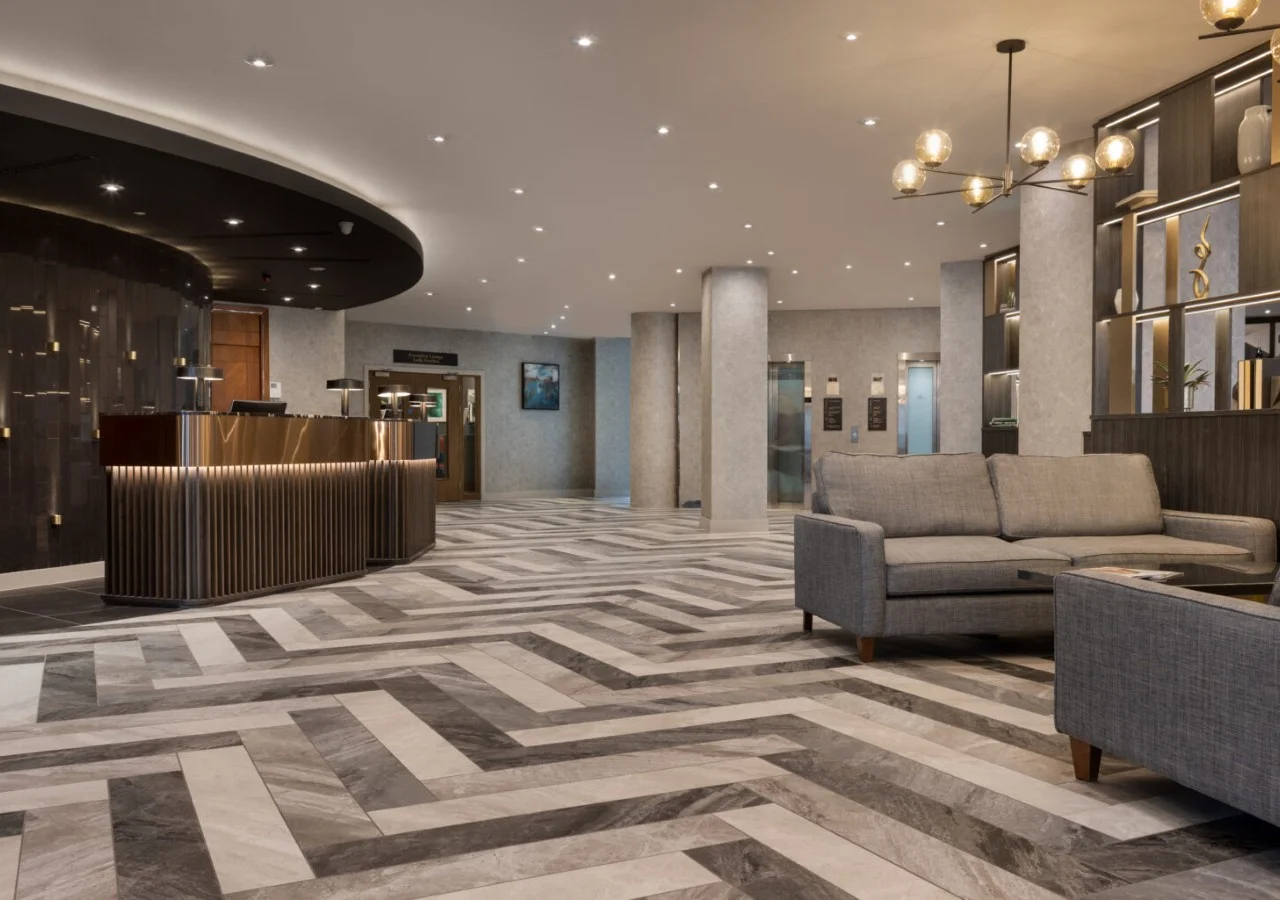 Modern hotel lobby with stylish furniture.